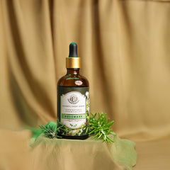 Enhanced Essentials Rosemary Essential Oil in amber glass protecting from light for lasting purity.