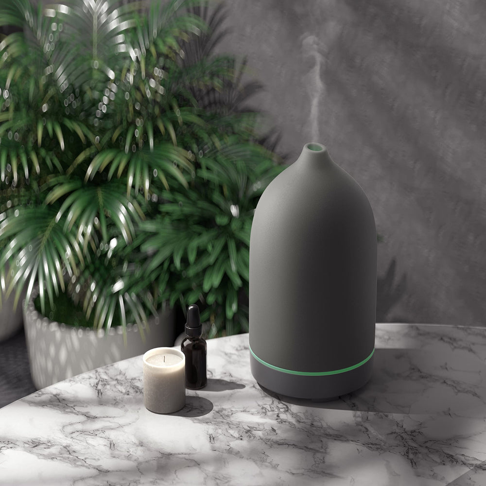 ENILYM diffuser in a living room setup creates inviting ambiance for conversations and relaxation.