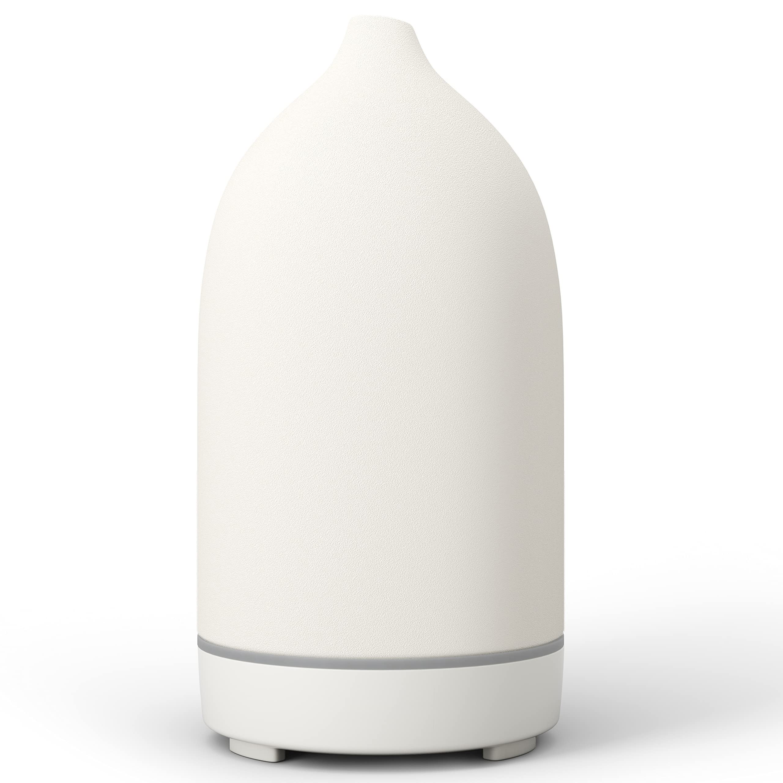 ENILYM essential oil diffuser ceramic white closeup showing handcrafted craftsmanship and compact form