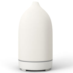 ENILYM essential oil diffuser ceramic white closeup showing handcrafted craftsmanship and compact form