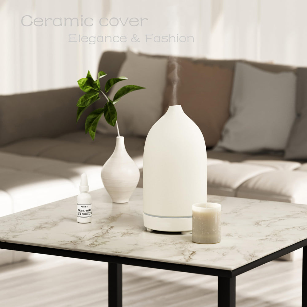 ENILYM essential oil diffuser ceramic white night light creates a warm ambient glow
