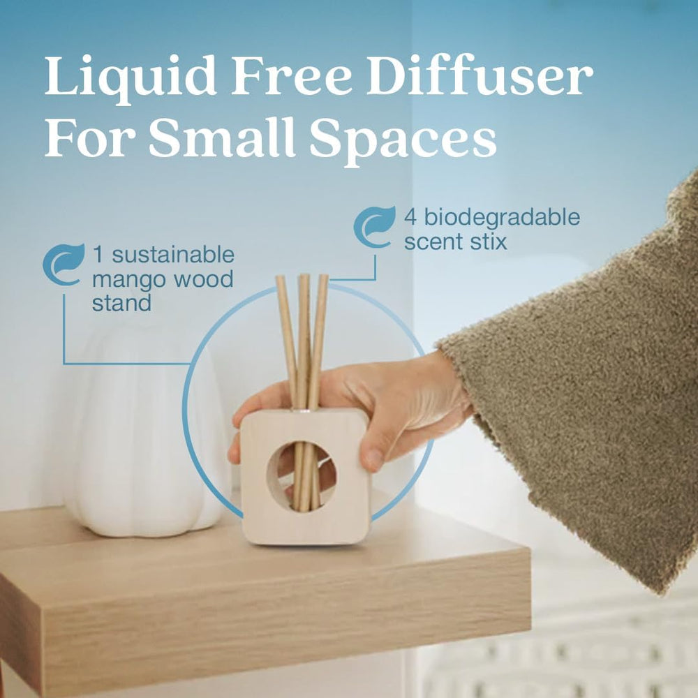 Enviroscent living room fragrance setup featuring stand and refill for inviting ambiance.