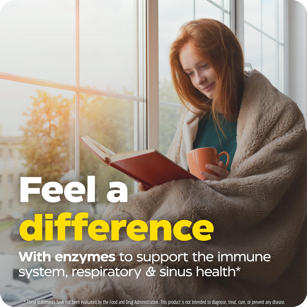 Enzymedica Immune Defense regular-strength tablet in hand for everyday immune support.