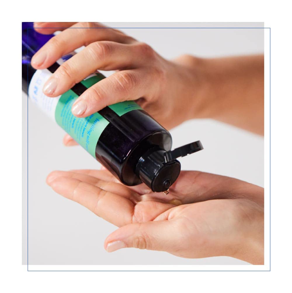 EO hand soap organic botanical blend bottle highlights calendula, chamomile, white tea for soothing skin.