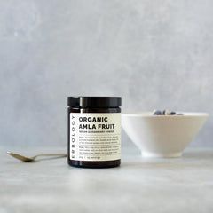 Erbology Amla Powder packaging on shelf emphasizes small-batch sourcing