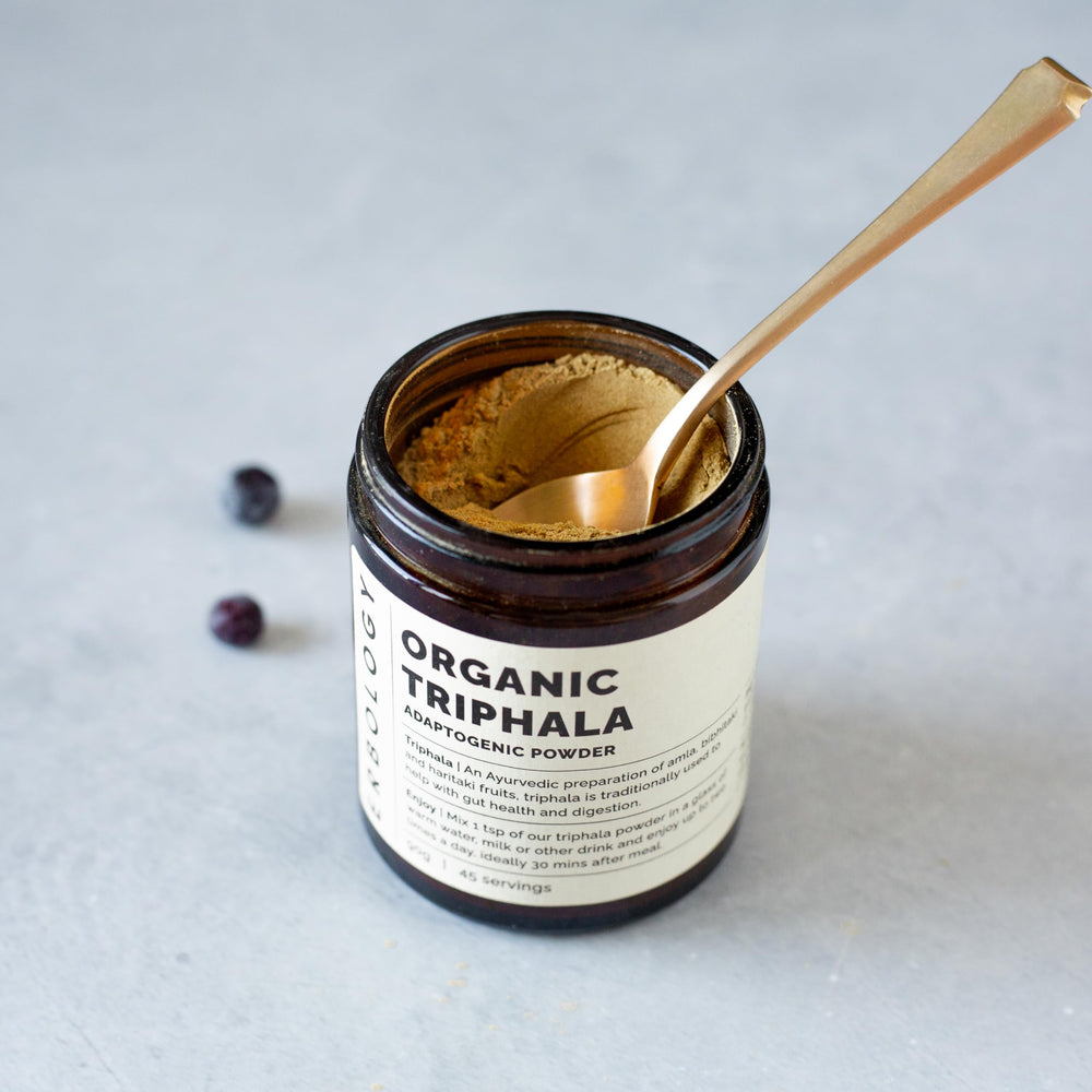 Erbology Triphala powder bottle back label emphasizes traceability and quality.