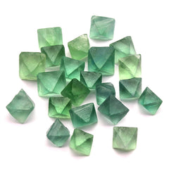 Erliway green fluorite octahedron with high luster enhances meditation spaces.