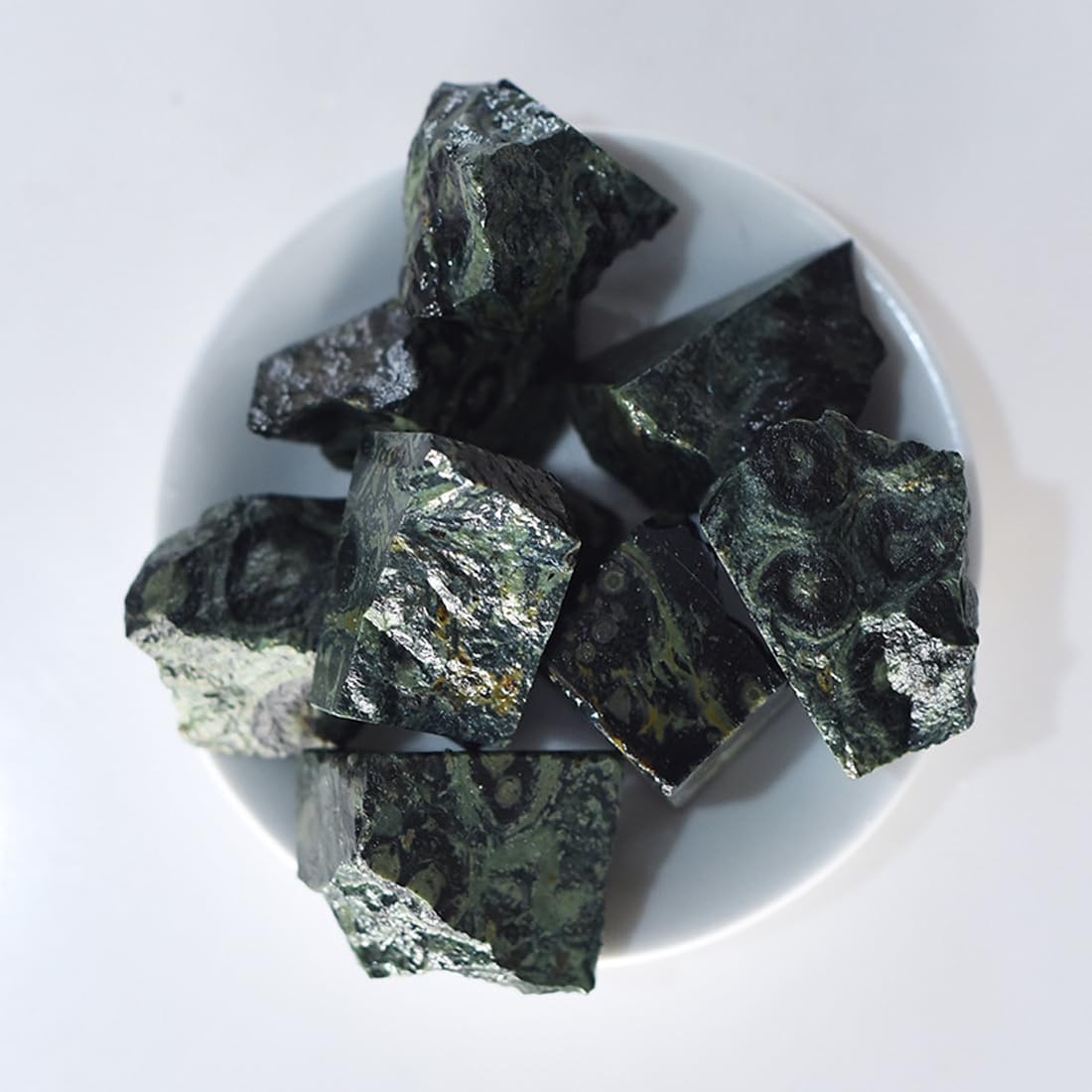 Erliway malachite rough stone closeup, vibrant color and texture for collection