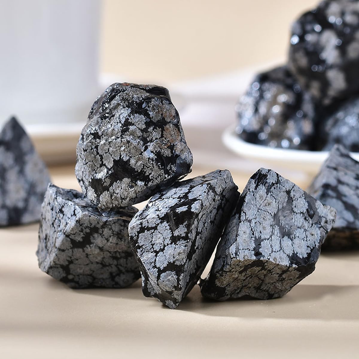 Erliway Snowflake Obsidian close up shows sparkles and texture for energy balance
