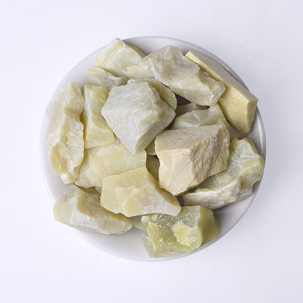 Erliway Yellow Jade raw crystal side view showing natural color and texture.