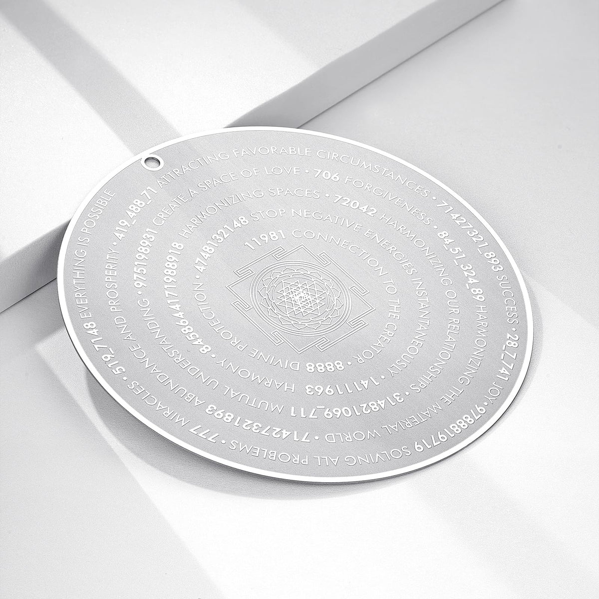 ESLINOP Sacred Geometry Disc front view on a table, calm entry energy.
