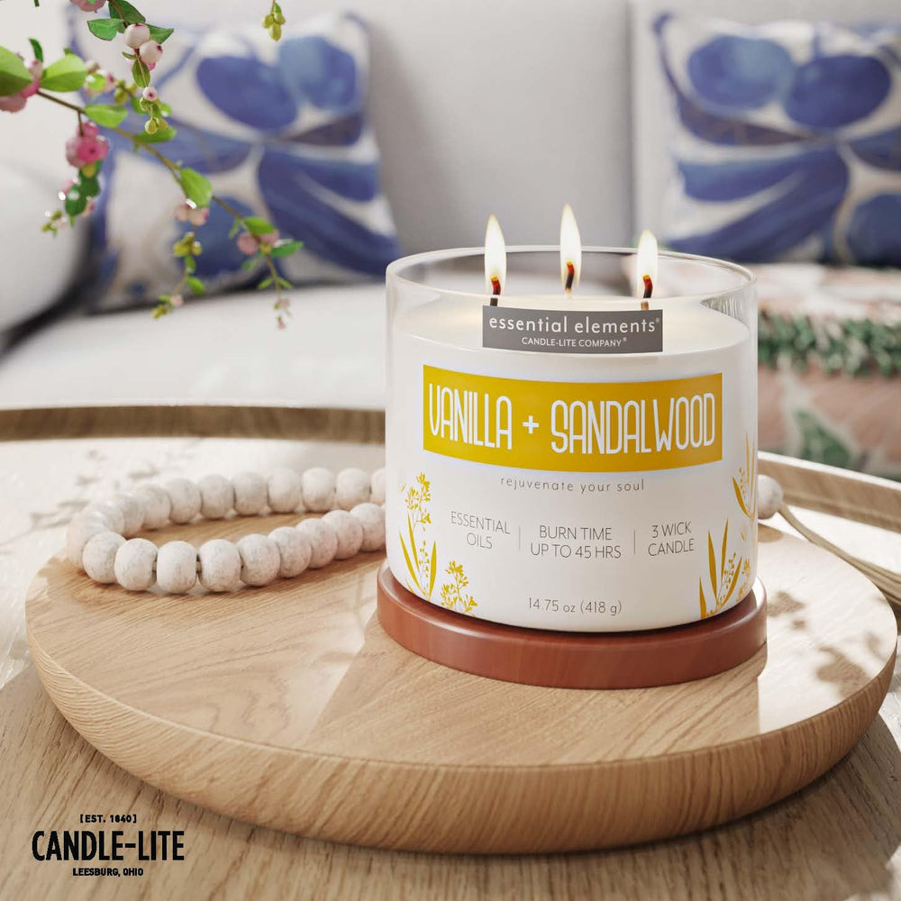 Essential Elements 14.75 oz candle fits desks and coffee tables for ambience.