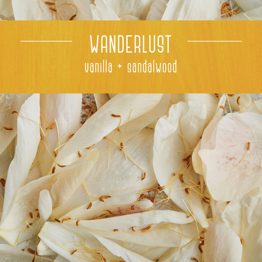 Wanderlust fragrance blends sandalwood, orange, and patchouli for calm ambiance