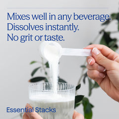 Pouring Essential Stacks powder into a glass for easy mix
