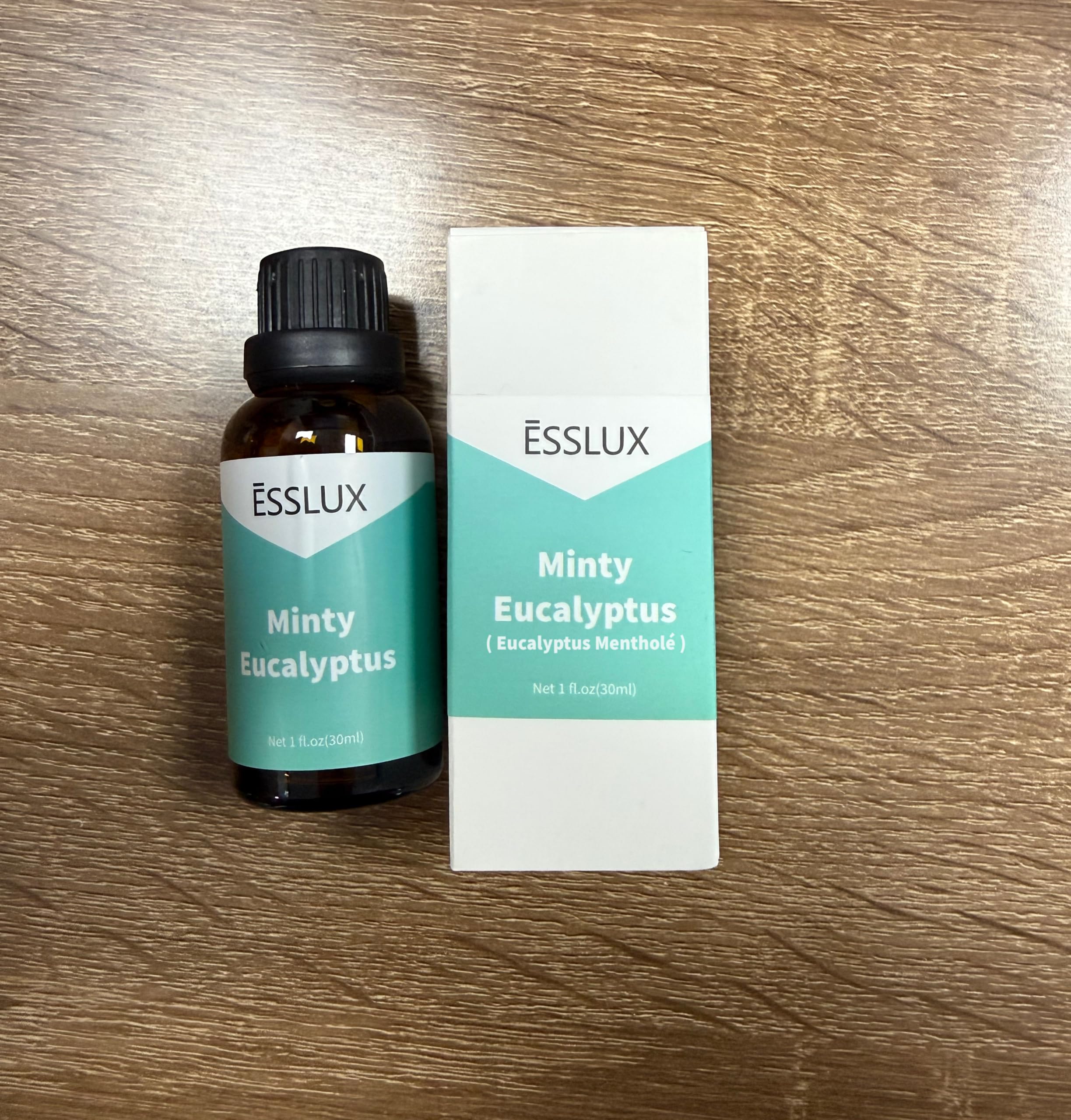 ESSLUX Minty Eucalyptus room spray release for a fresh home vibe.