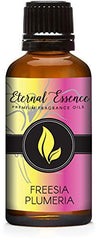 Eternal Essence Oils Freesia Plumeria 30ml bottle with pour cap for precise dispensing.