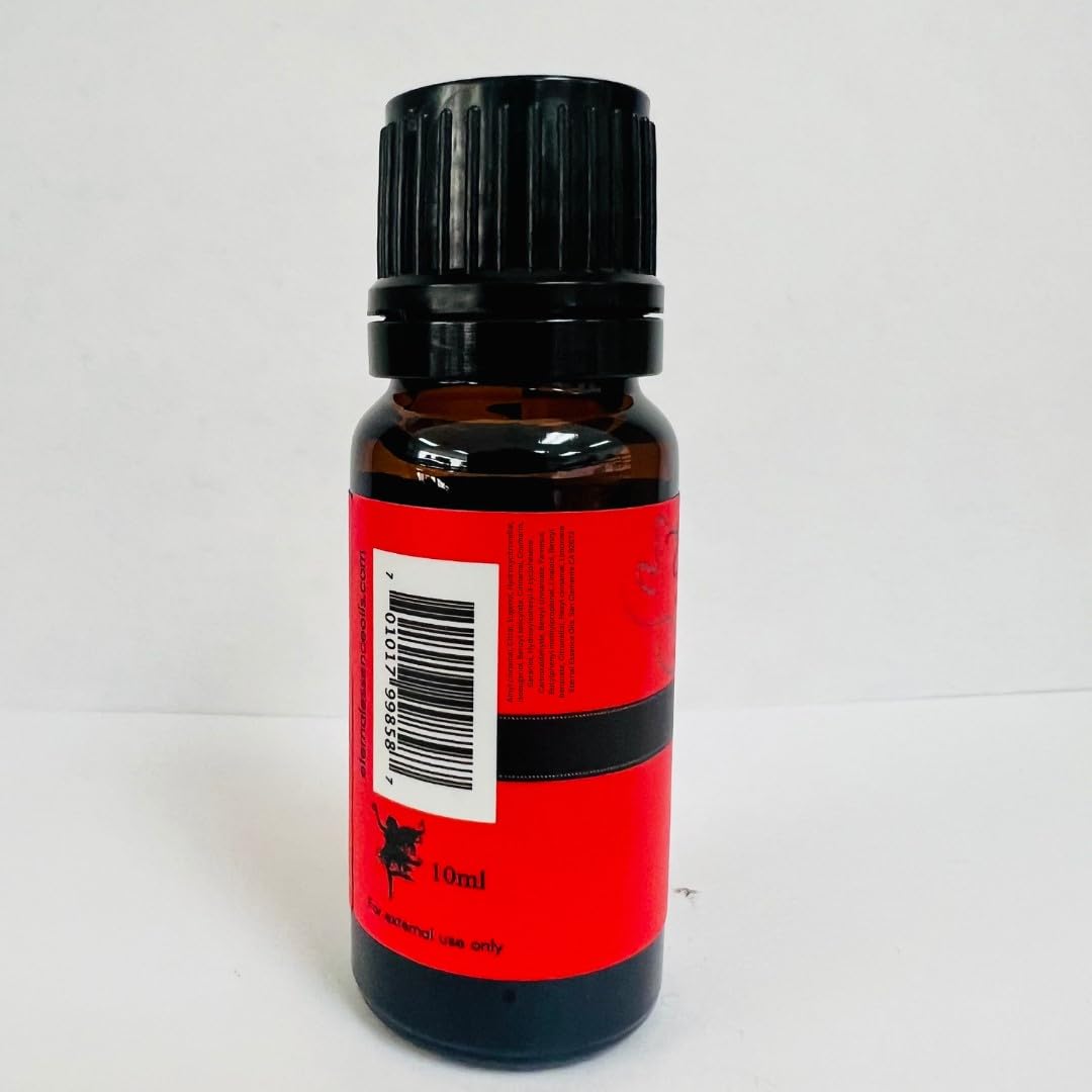 Eternal Essence Oils dropper bottle in use for precise fragrance dispensing.