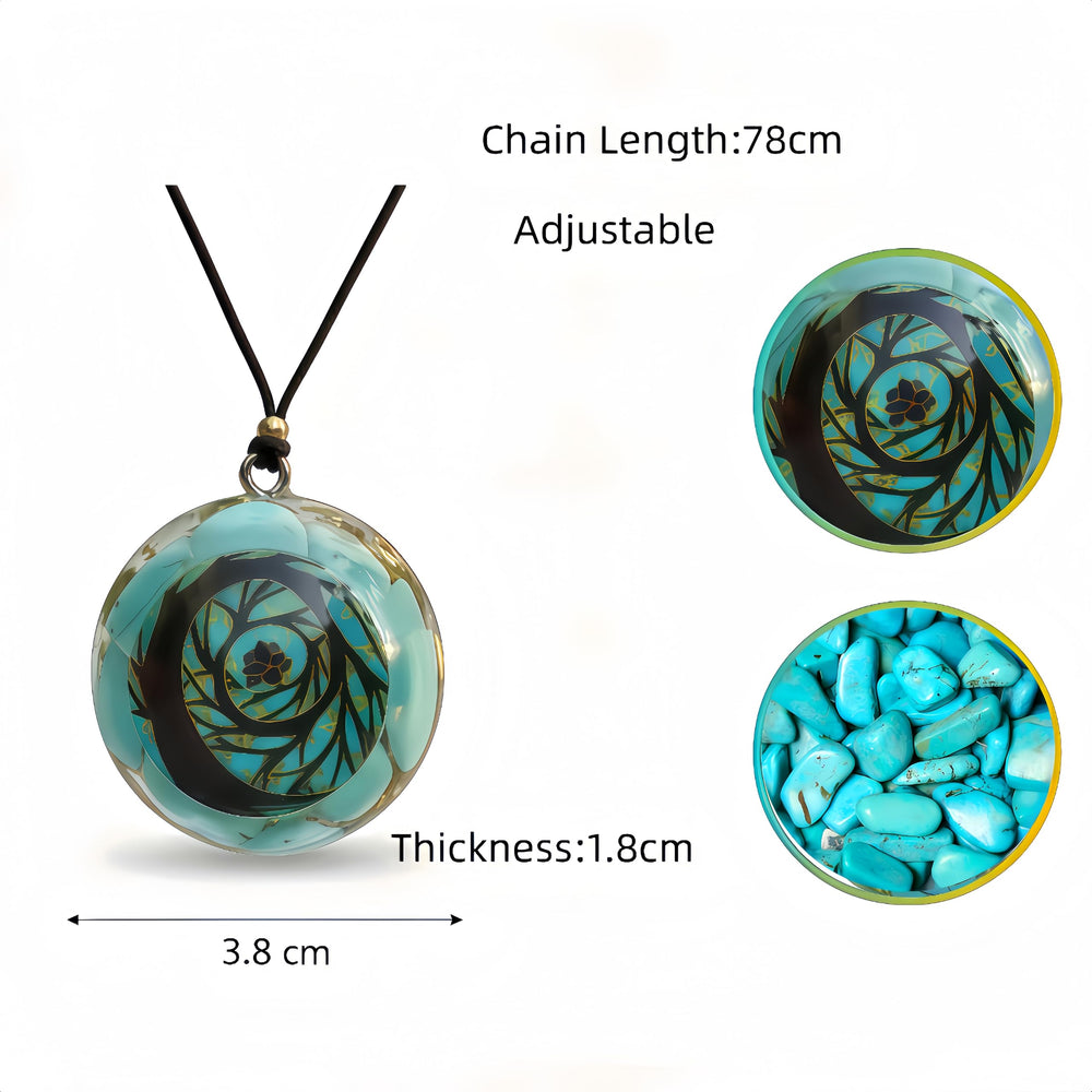 EternalOrgone turquoise pendant close-up highlights natural stone and gold foil details.