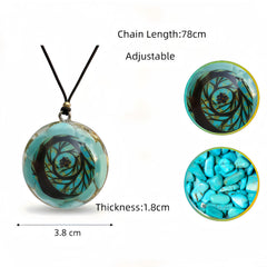 EternalOrgone turquoise pendant close-up highlights natural stone and gold foil details.