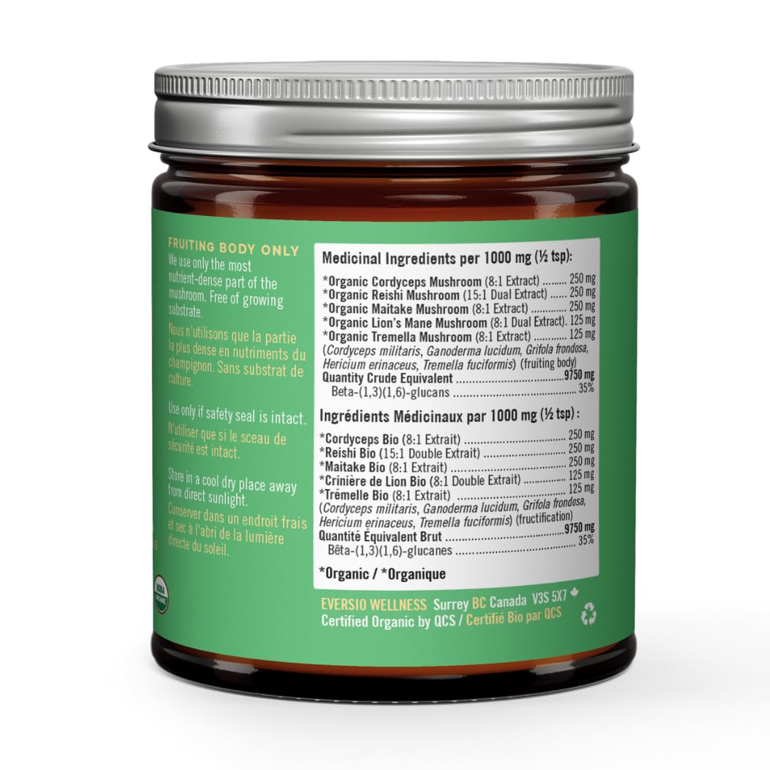 Scoop measuring 1 g of Eversio Wellness 5 Mushroom Blend for precise servings.