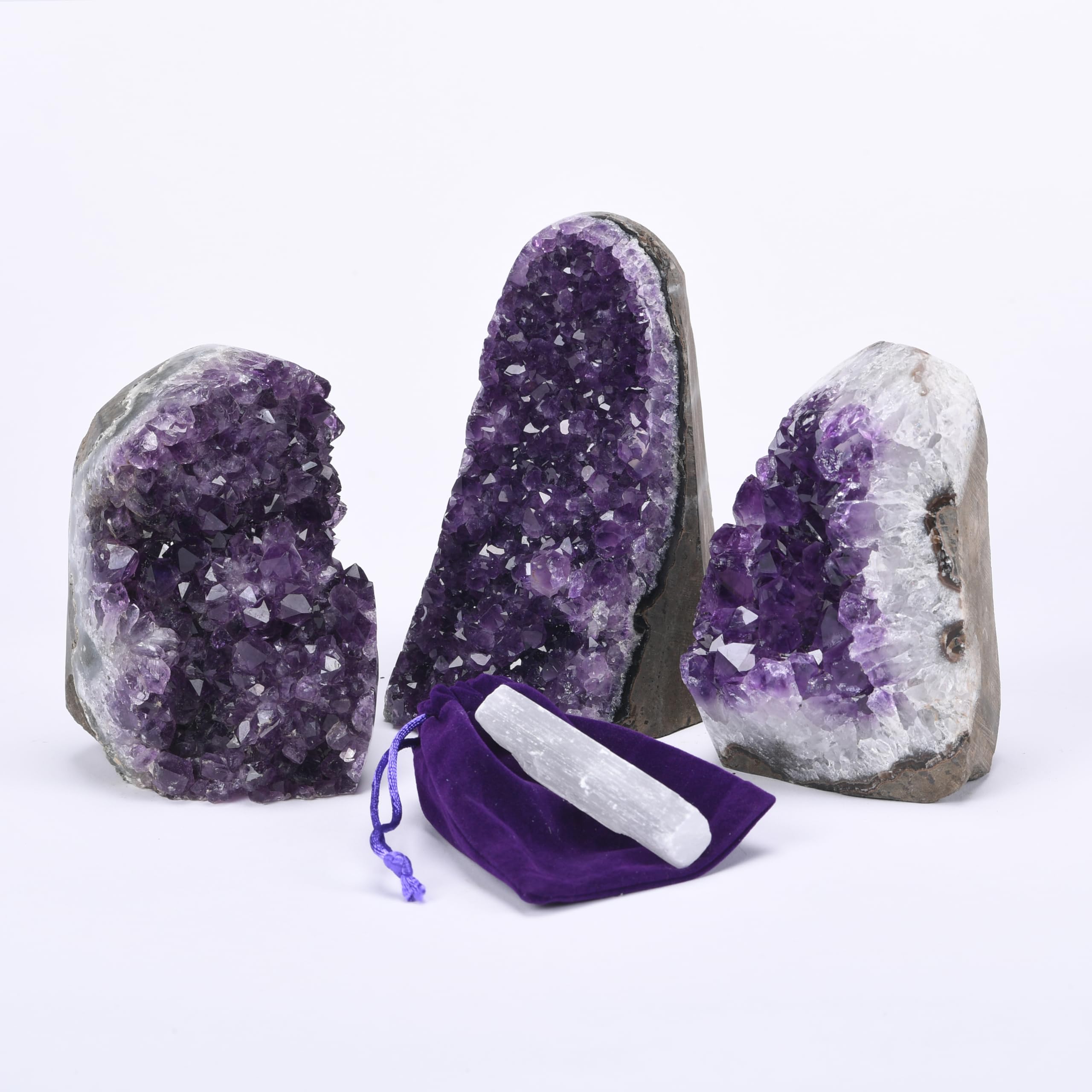 Extreme Rocks & Fossils basalt base support, stable display for large amethyst centerpiece.