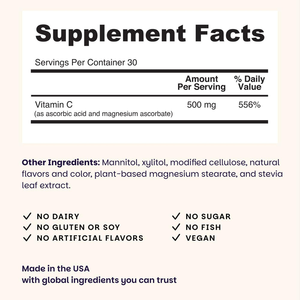 Close-up of EZ Melts Vitamin C orange citrus tablet.