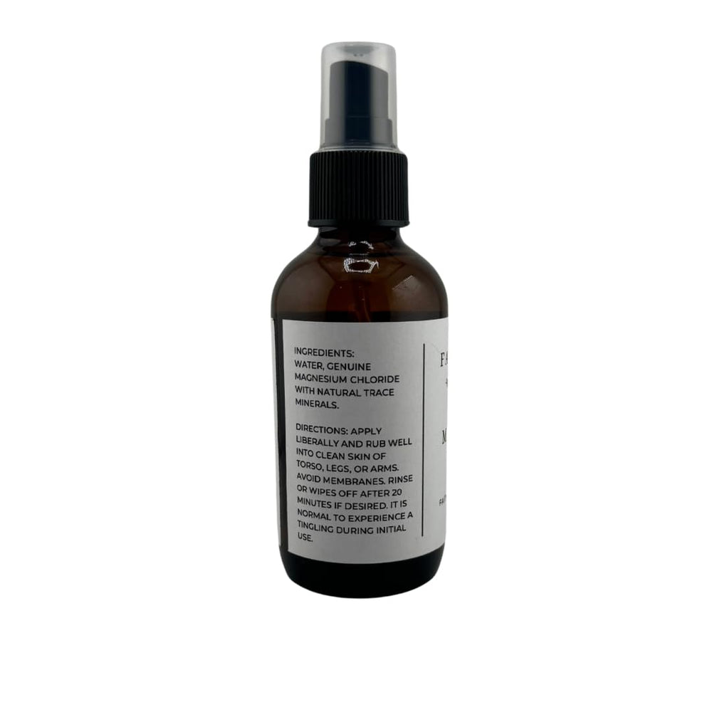 Spray bottle in action for quick, non-greasy application on shoulders.