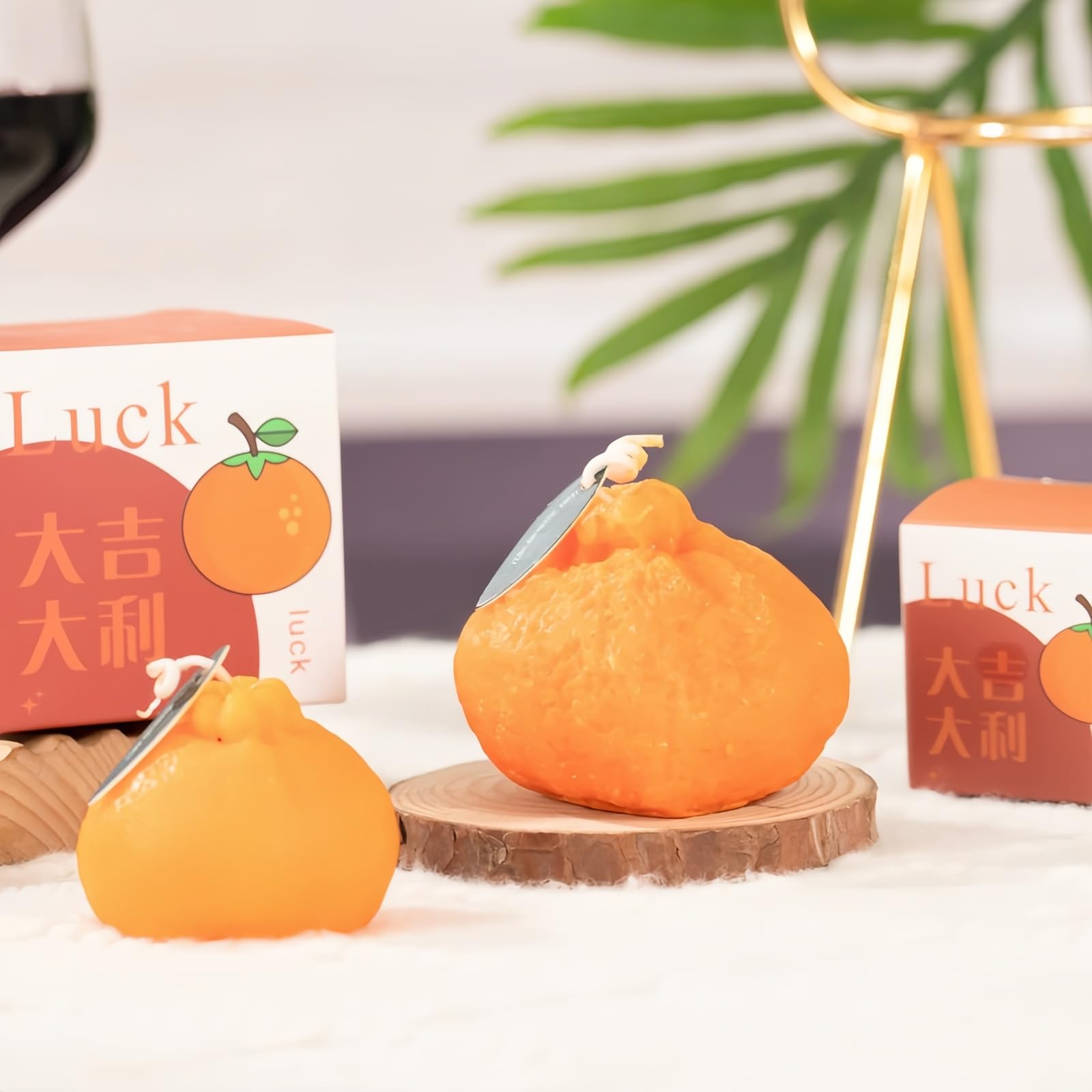 FANBODTA orange candle gift-ready box signals thoughtful present for home decor lovers.