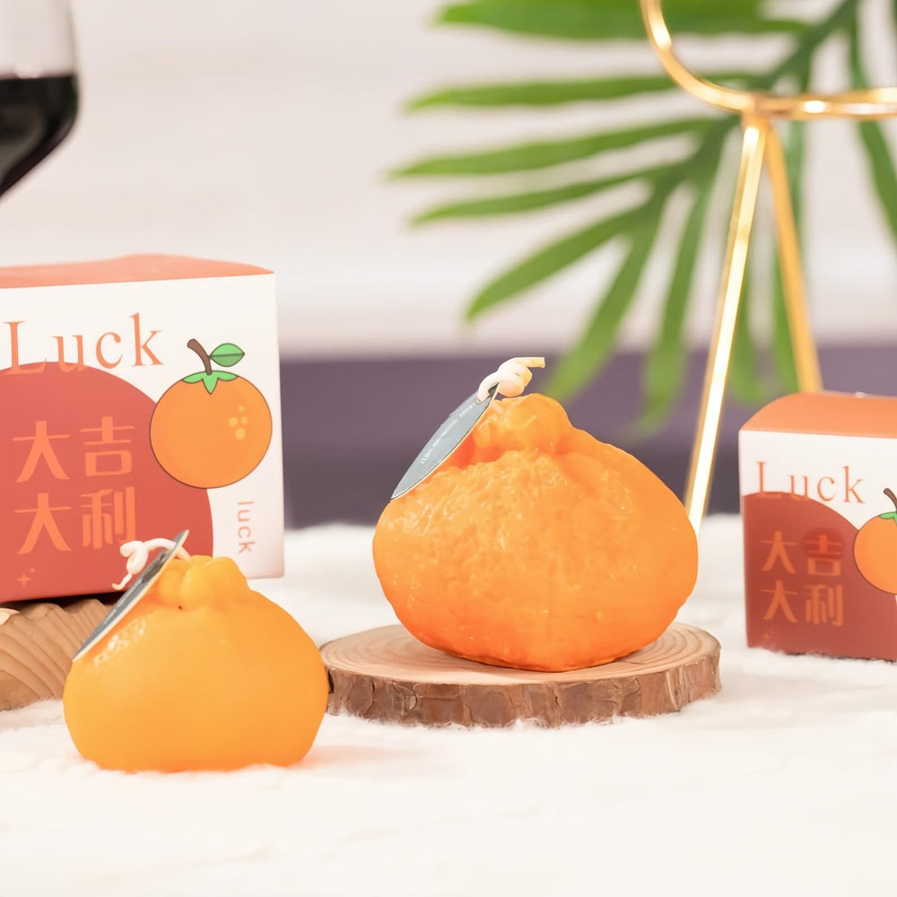 FANBODTA orange candle gift-ready box signals thoughtful present for home decor lovers.