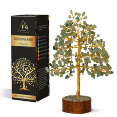 FASHIONZAADI Green Jade Crystal Tree of Life on a desk for focus and good fortune.