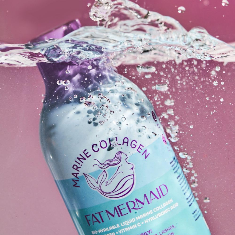 Fat Mermaid bottle with a glass of water to suggest hydration-friendly use.