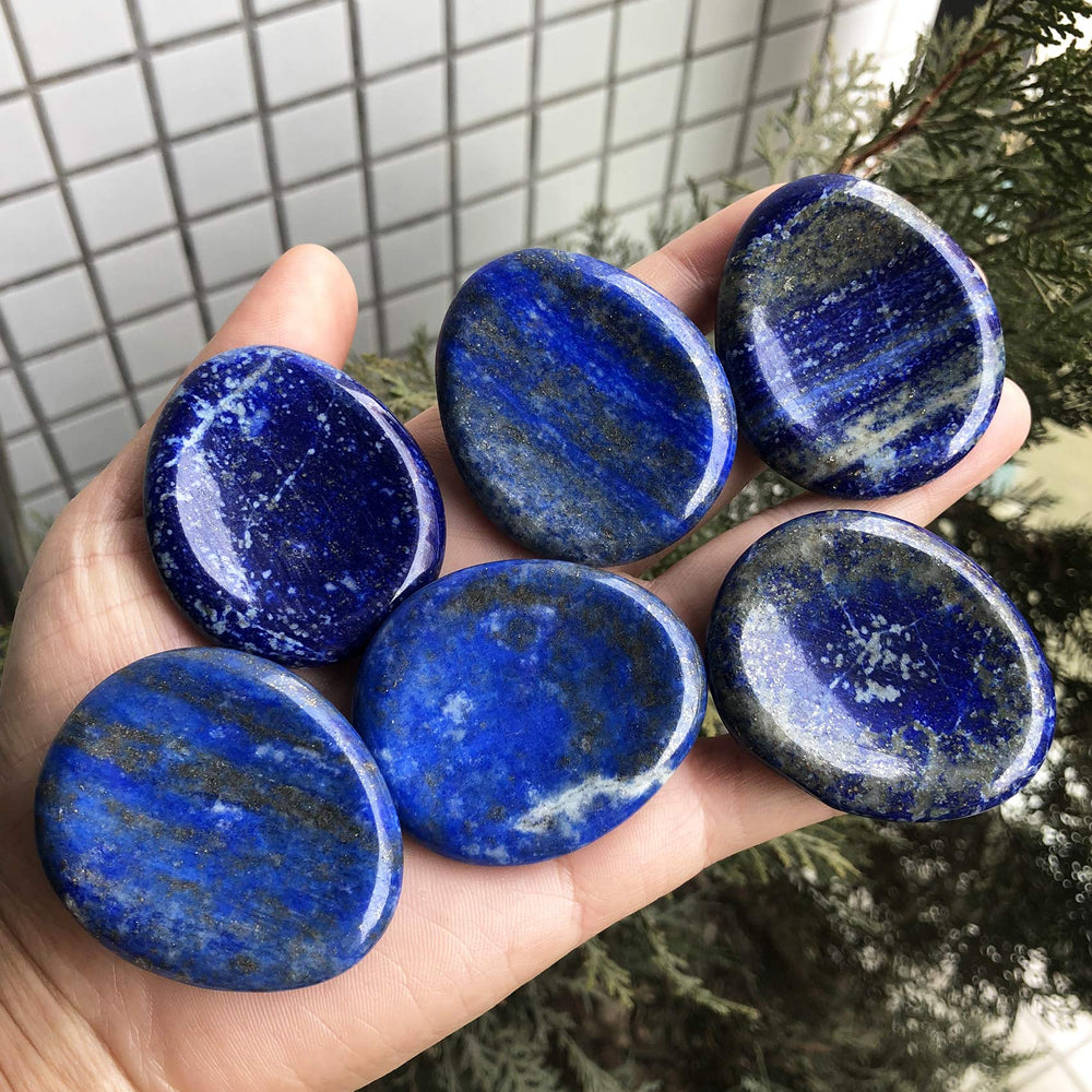 Favoramulet carved palm stone lapis lazuli ideal for mindful breathing and stress relief.