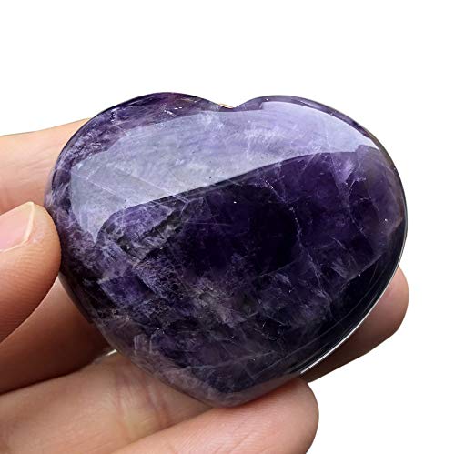 Favoramulet handcarved amethyst heart stone closeup showing unique patterns