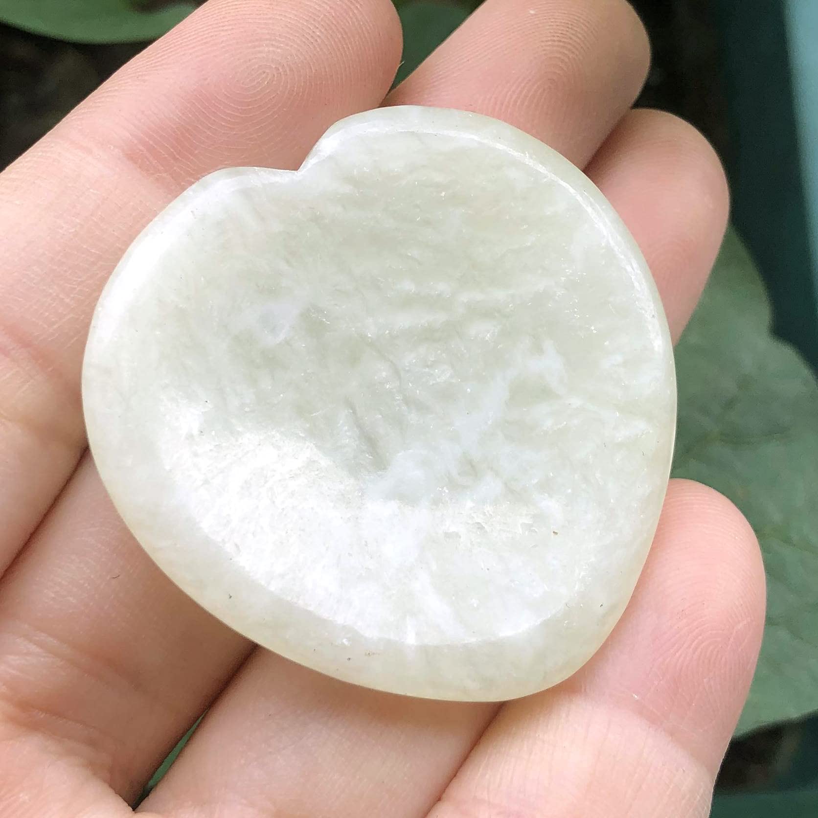 Favoramulet light green jade palm stone, handmade and smooth for pocket meditation.