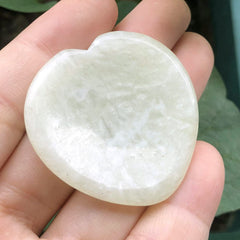 Favoramulet light green jade palm stone, handmade and smooth for pocket meditation.