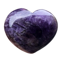 Favoramulet natural purple amethyst heart stone held in palm for calm focus