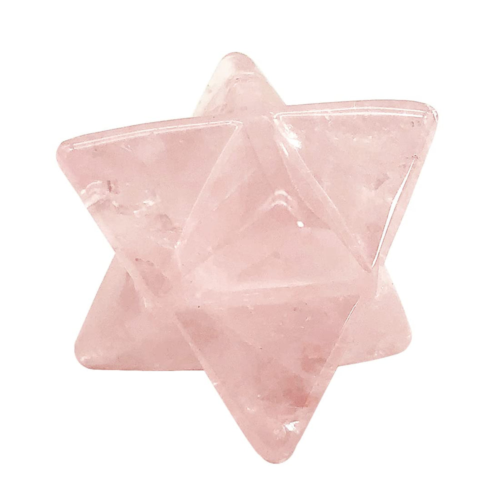 Favoramulet rose quartz merkaba star held in palm highlighting compact size and presence.