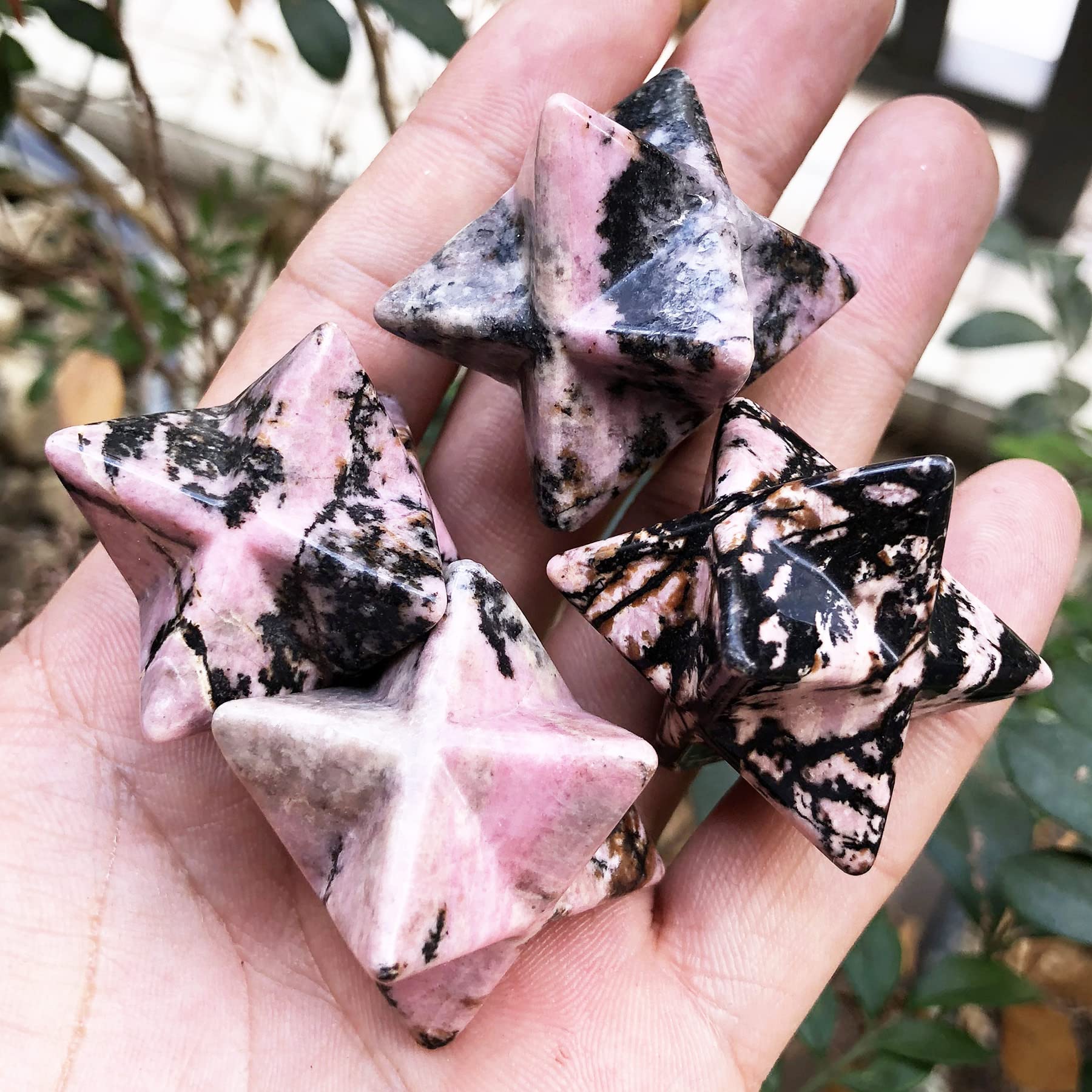 Fekuar Rhodonite Merkaba Star as a pocket ritual companion for meditation and calm nights.