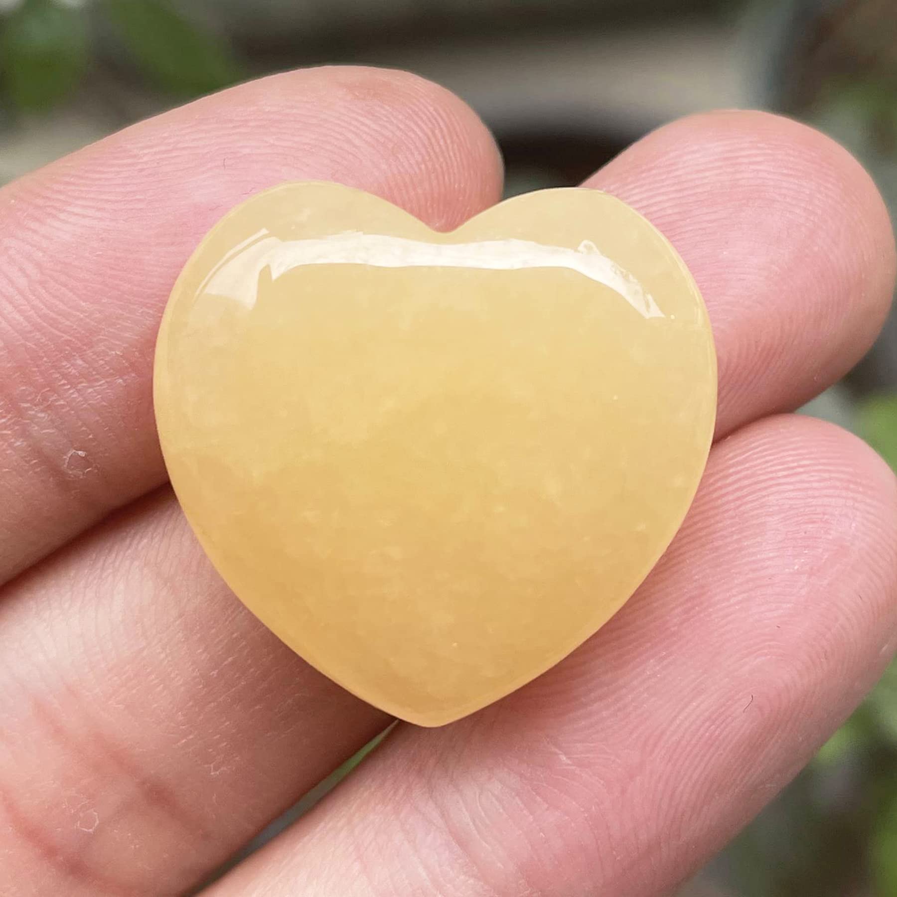 Fekuar romantic polished heart stone for gifting and decorative display.