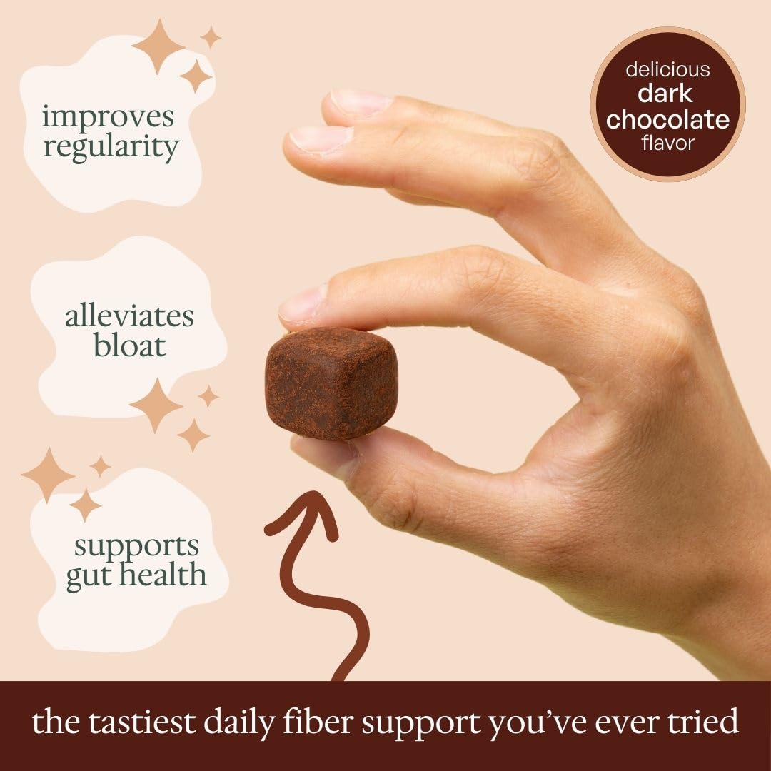 Fiome Fiber Bites dark chocolate bite close-up with texture.