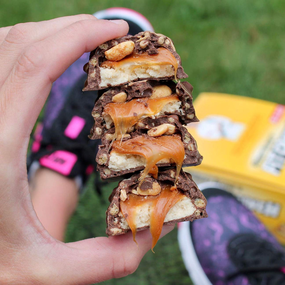 Athlete enjoying a FITCRUNCH snack during training.