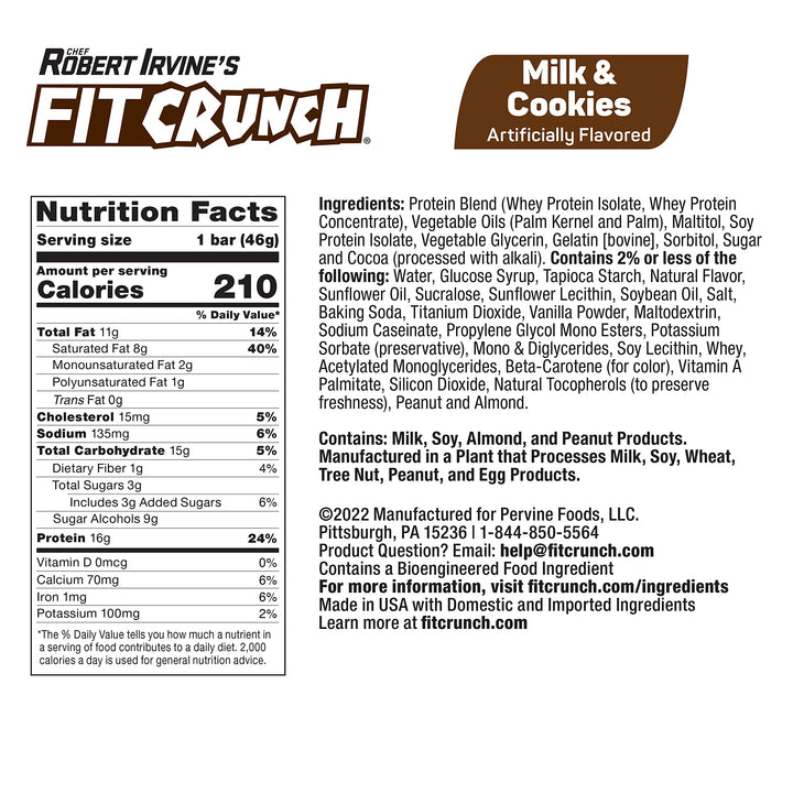 FITCRUNCH Milk and Cookies bar cross-section reveals soft cake core and layers.