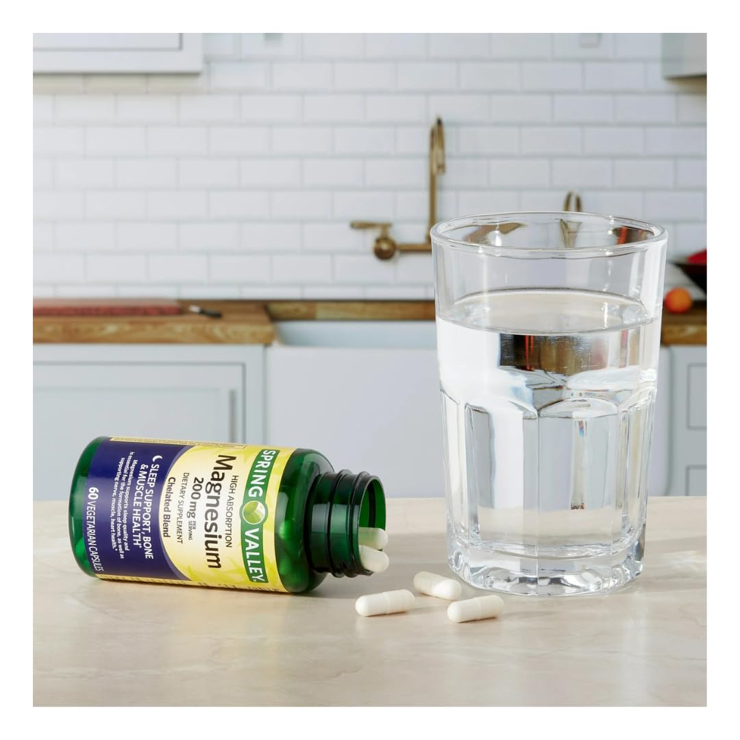 Close-up of FitMania Spring Valley magnesium capsules, 200 mg each.