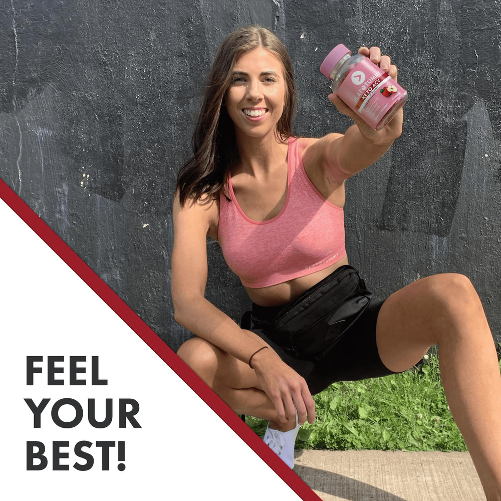 Flat Tummy Keto ACV Gummies held in hand for on-the-go support.