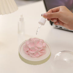 FLCSIed passive diffuser featuring a peony flower for subtle scent in small spaces.