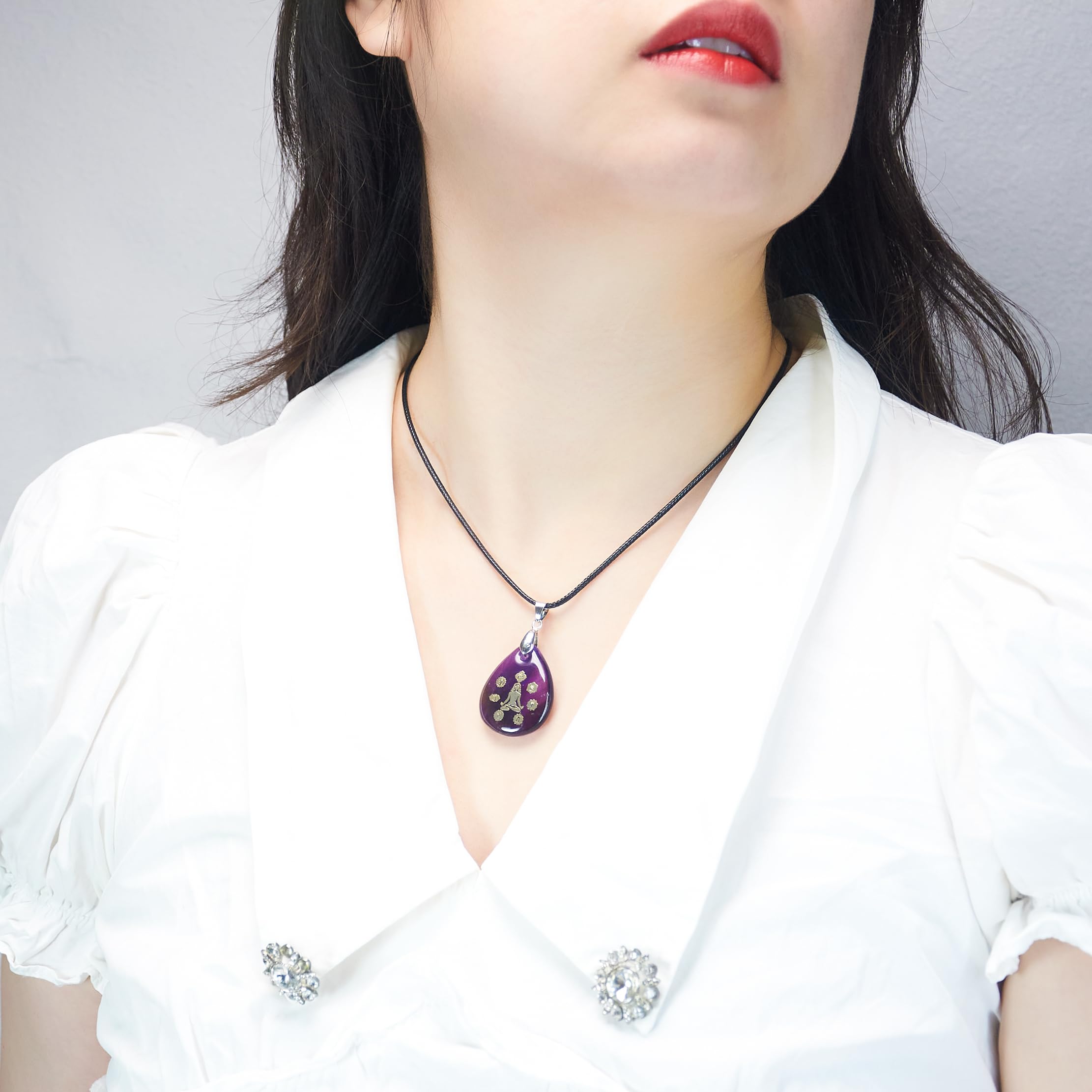 Flemtai clear quartz waterdrop pendant for amplified intention in making.