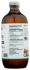 Flora MCT oil label on glass bottle showcasing organic and keto-friendly ingredients.