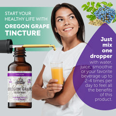 Dropper dispensing Florida Herbs Oregon Grape tincture for easy use.