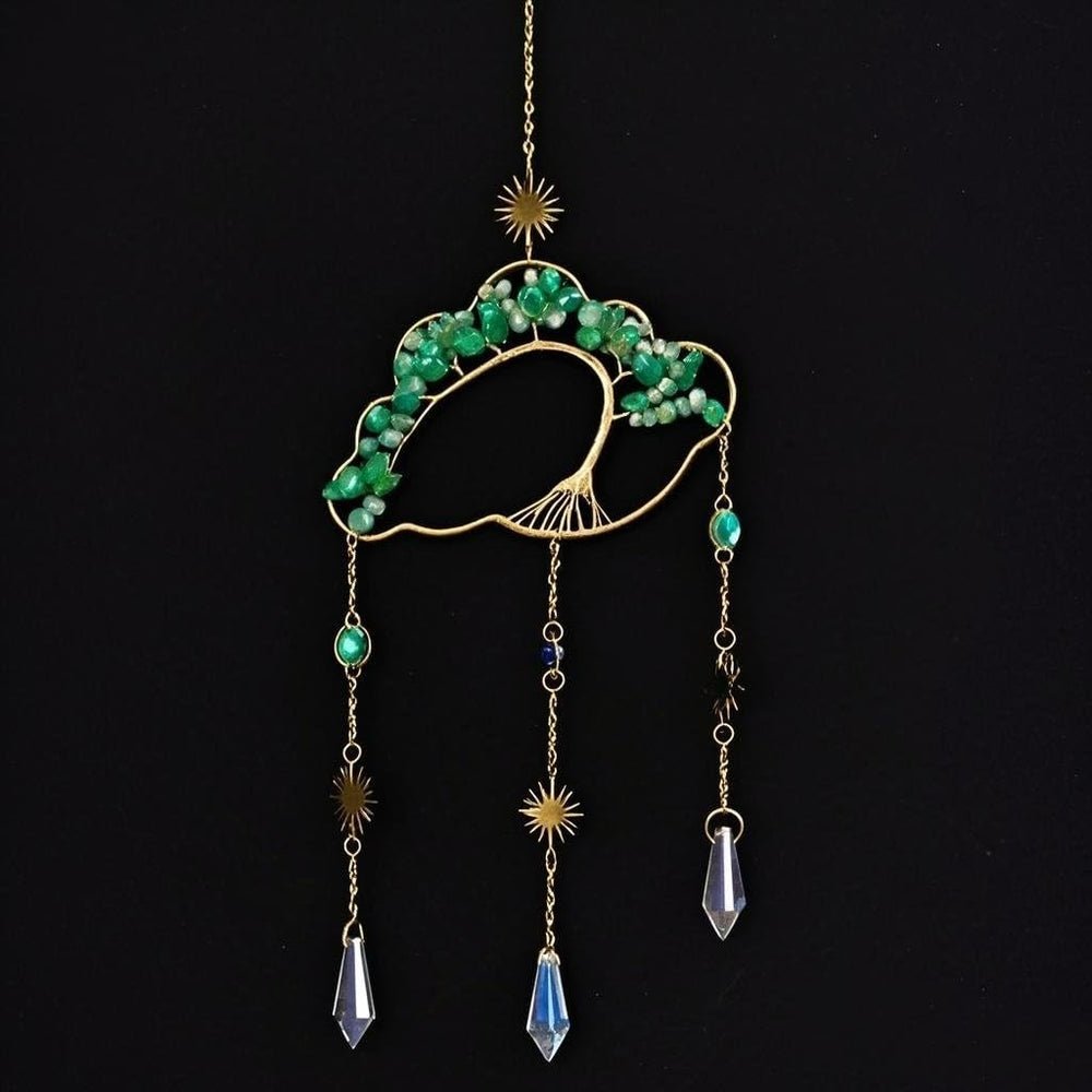 Fmelut Crystal Cloud Suncatcher on a sunny window creating sparkling light