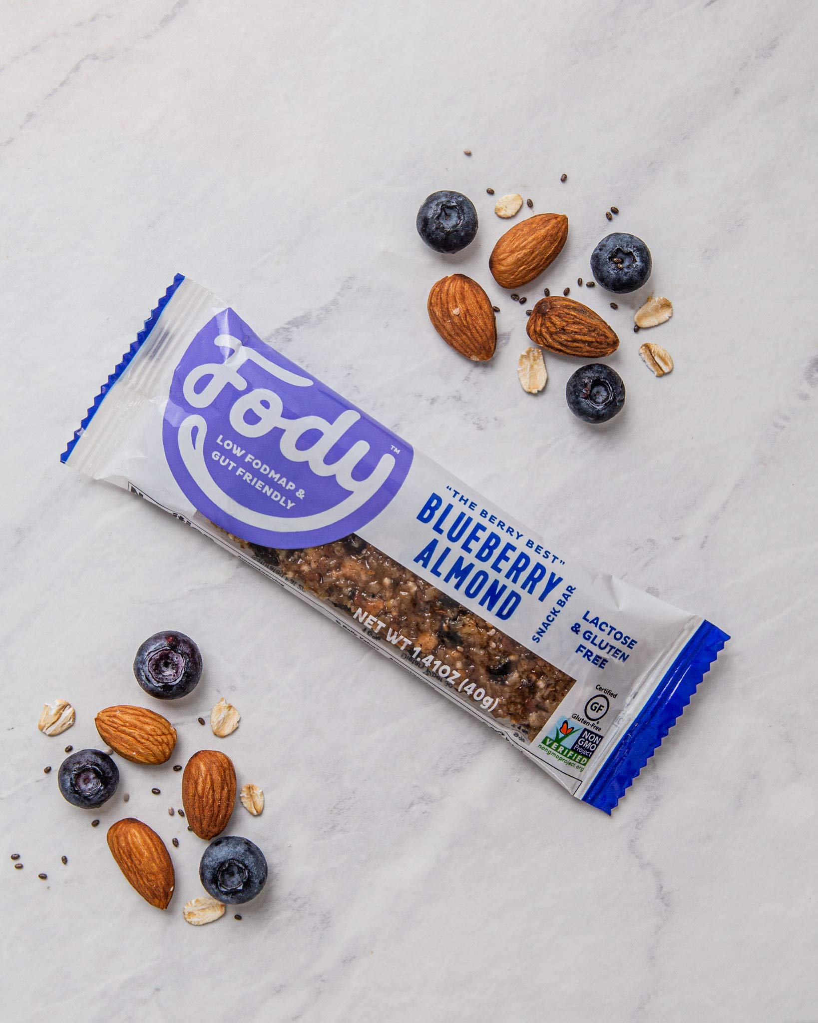 Ingredients visible: oats, flax, chia, quinoa, almonds, and blueberries.